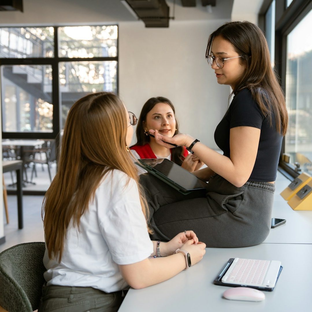 Marketing team collaborating on digital strategy and campaign planning in a modern office